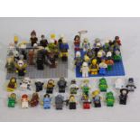 Lego - A collection of various figures and Lego figures to include Ninjago, The Simpsons, Star Wars,