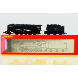 Hornby - A boxed Hornby OO gauge R2137 Class 9F 2-10-0 steam locomotive and tender Op.No.