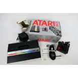 Atari - A boxed vintage Atari 2600 Video Computer System.