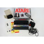 Atari - A boxed vintage Atari 2600 Video Computer System.