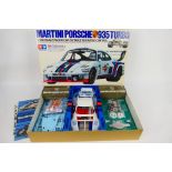 Tamiya - A boxed unmade motorised Porsche 935 Turbo model kit in 1:12 scale # RA1202.