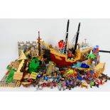 Fisher Price - Imagine - A collection of toys including a wooden castle and a a pirate ship play