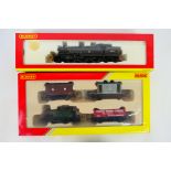 Hornby - A boxed Hornby OO gauge locomotive with a boxed Hornby OO gauge train pack.