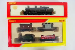 Hornby - A boxed Hornby OO gauge locomotive with a boxed Hornby OO gauge train pack.