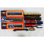 Lima - A rake of boxed and unboxed HO/OO gauge passenger and freight rolling stock from Lima.