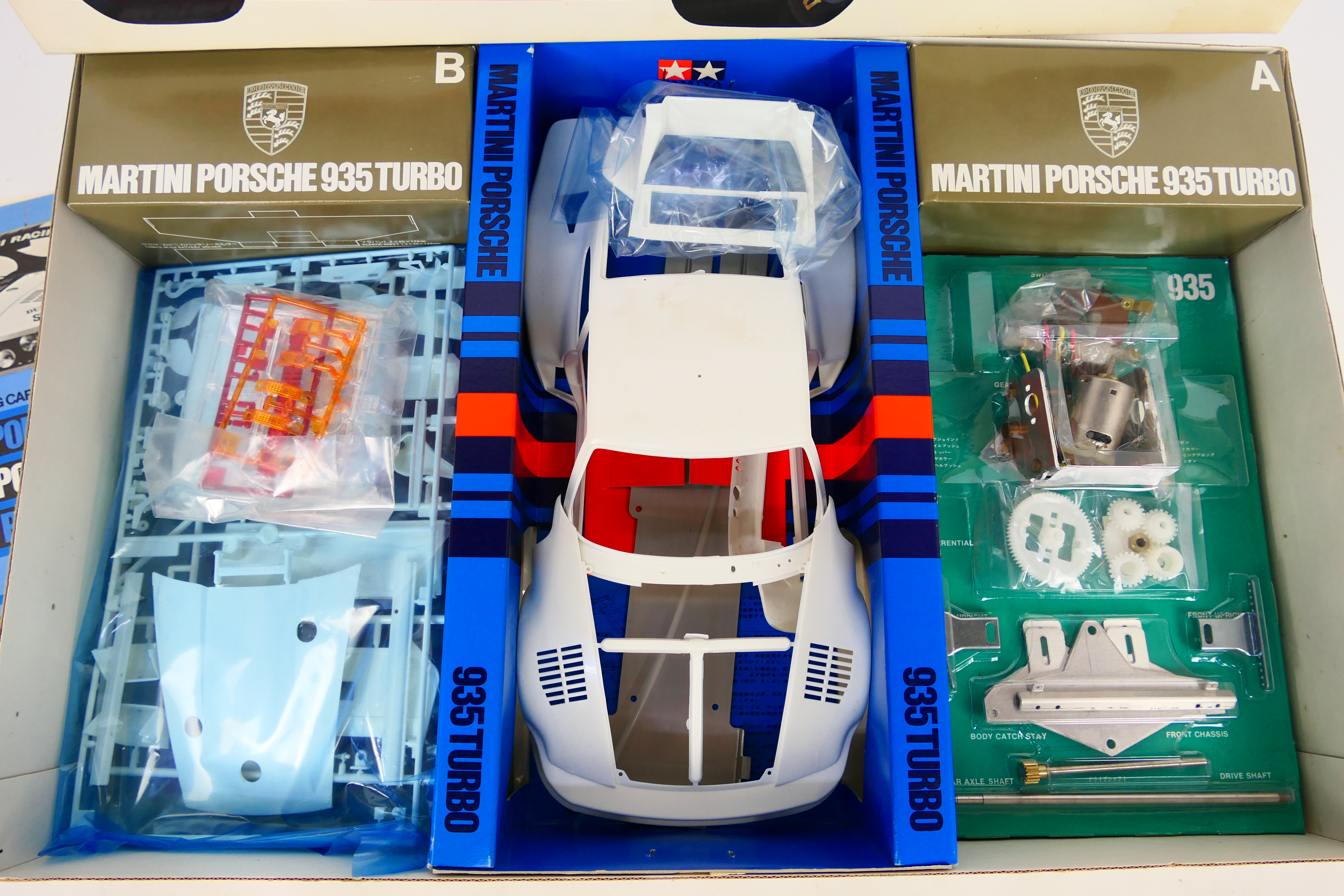 Tamiya - A boxed unmade motorised Porsche 935 Turbo model kit in 1:12 scale # RA1202. - Image 2 of 3