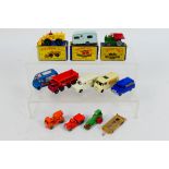 Matchbox - 12 x vehicles including a boxed Aveling-Barford Tractor Shovel # 43,