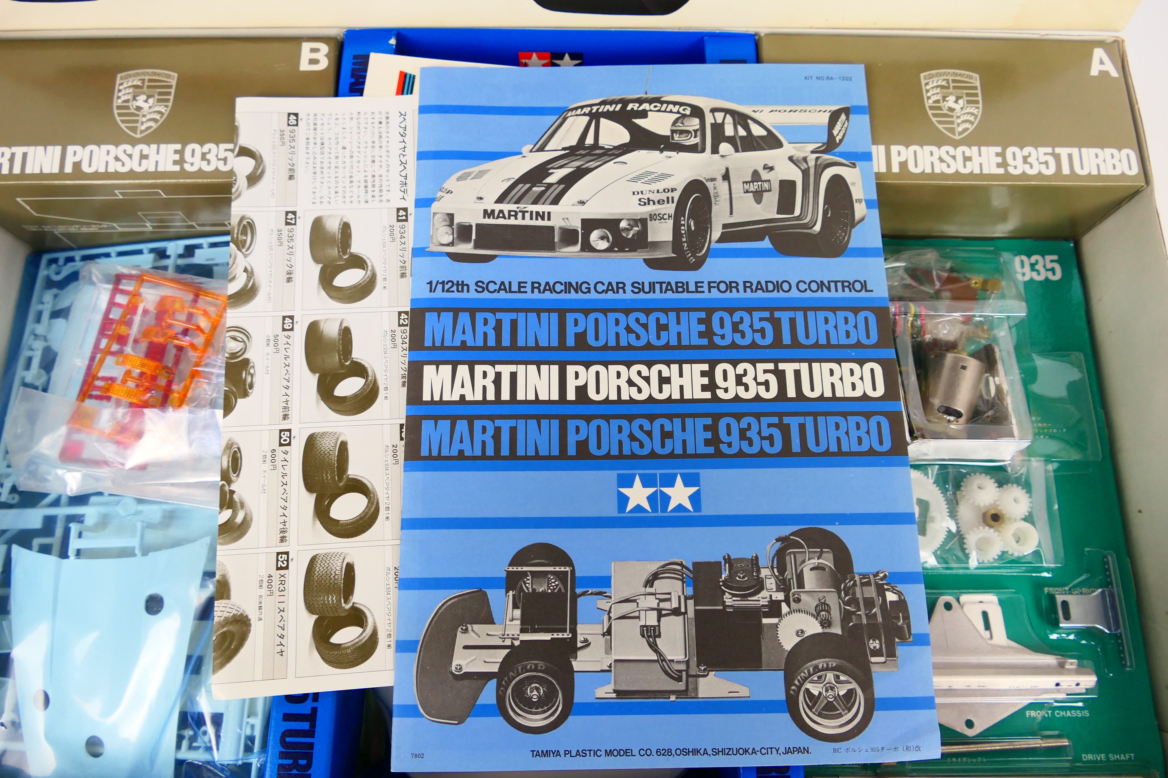 Tamiya - A boxed unmade motorised Porsche 935 Turbo model kit in 1:12 scale # RA1202. - Image 3 of 3