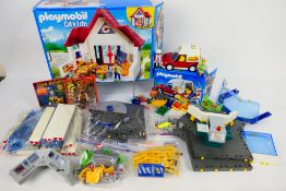 Playmobil - Two boxed Playmobil sets, two carded Playmobil figures and an unboxed set.