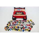 Galoob - Micro Machines - A 1998 Red Semi truck Rig Micro Machines Carry case containing over 60