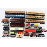 Triang - Mainline - Hornby - An unboxed group of OO gauge passenger and freight rolling stock.