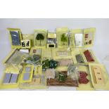 Hachette - A carded collection of OO gauge 'Your Model Railway Village' scenic accessories from