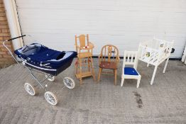 Silver Cross - Others - A collection of doll accessories that include a Silver Cross pram;