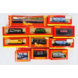 Hornby - 11 boxed items of Hornby OO gauge rolling stock.