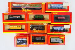 Hornby - 11 boxed items of Hornby OO gauge rolling stock.