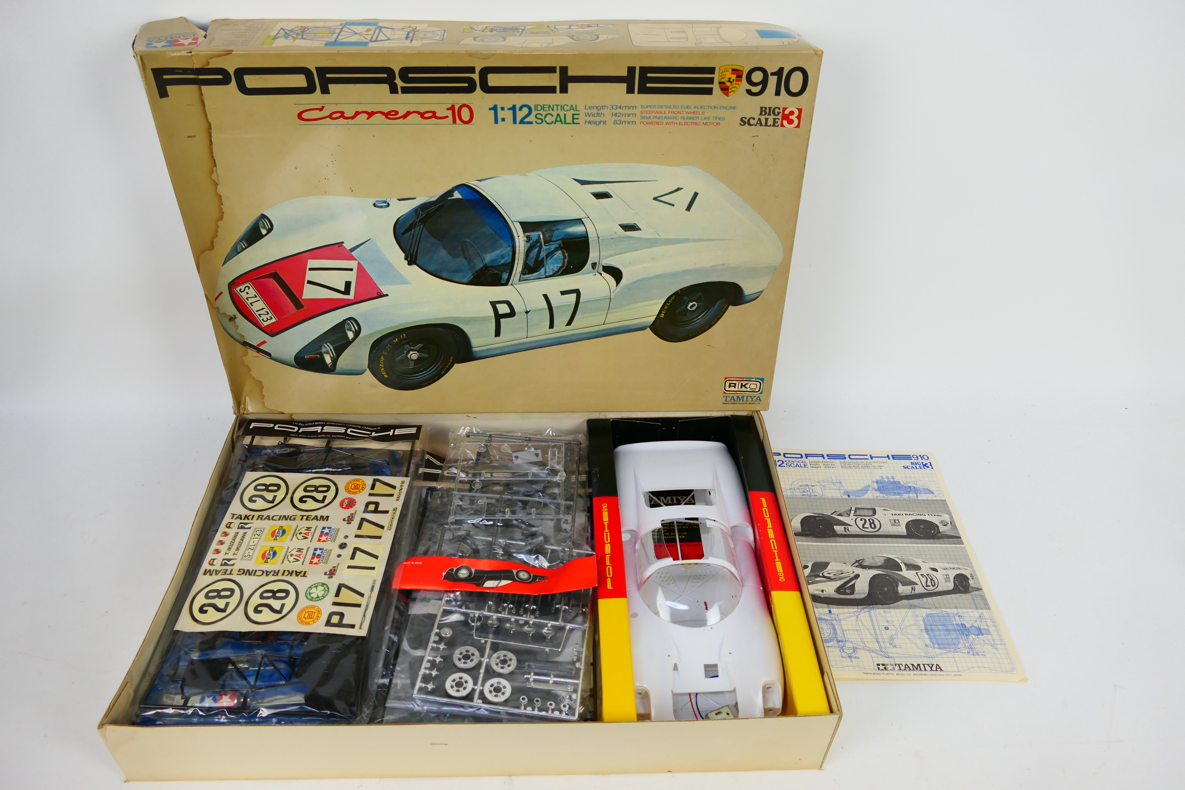 Tamiya - A boxed unmade Porsche Carrera 10 model kit in 1:12 scale # BS1203. Released in 1968.