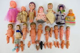 Kewpie - A collection of unboxed Japanese Kewpie celluloid dolls in various sizes.