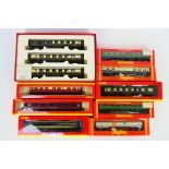 Hornby - A rake of boxed Hornby OO gauge mainly passenger coaches.