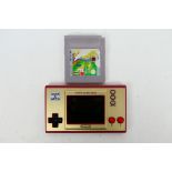 Nintendo - Game & Watch. A loose, 35th Anniversary of Super Mario Bros handheld Game & Watch.