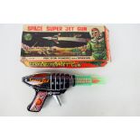 Space Super Jet Gun - a 1960s friction powered tin plate and plastic gun by KO Toys (Yoshaya of