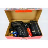 Scalextric - A quantity of track, 4 x controllers, 2 x power adaptors, barriers,