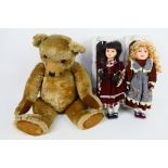 Unbranded - 2 x boxed porcelain dolls and a large vintage jointed teddy bear.