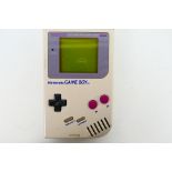 Nintendo - An unboxed Nintendo Game Boy dated 1989.