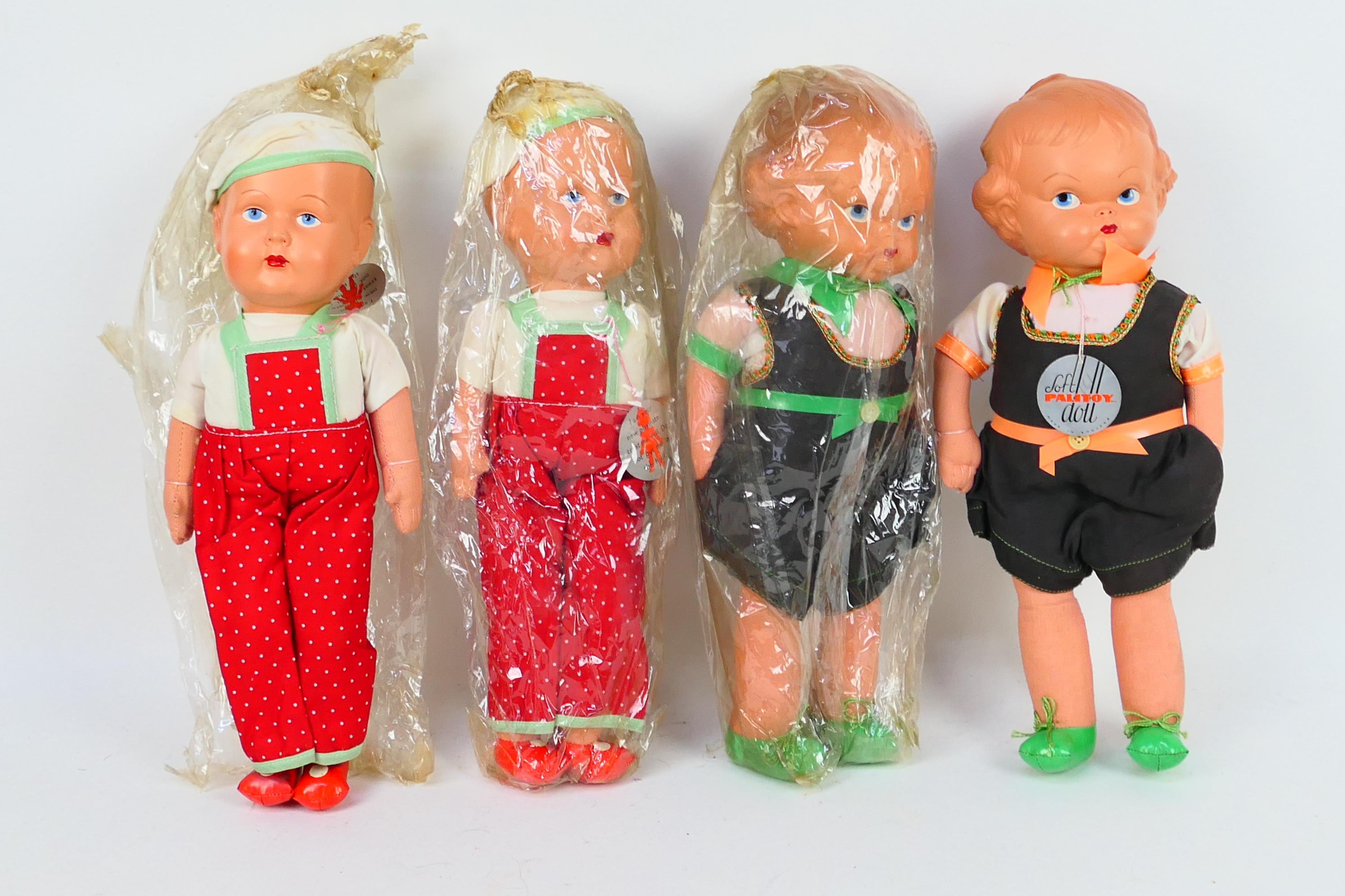 Palitoy - Four bagged Palitoy Soft Dolls. Lot consists of two 14" boy dolls and two 14" girl dolls.