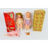 Palitoy - Two boxed vintage Palitoy 'Petal Skin' vinyl dolls.