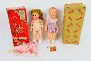 Palitoy - Two boxed vintage Palitoy 'Petal Skin' vinyl dolls.
