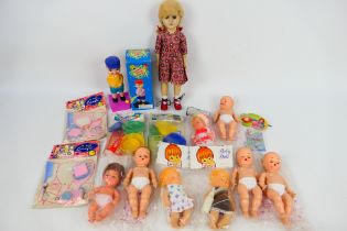 Palitoy - Others - An unboxed vintage Palitoy walker doll marked #Palitoy 35' to rear with a group
