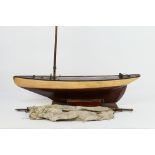 Unbranded - A large early 20th century wooden pond yacht on stand measuring 88 cm in length,