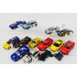 Scalextric - An unboxed group of 12 playworn Scalextric slot cars with some loose accessories.