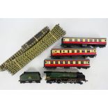 Hornby Dublo - A 3- rail 4-6-2 Duchess Of Montrose locomotive with 3 x red and cream coaches and