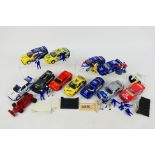 Scalextric - 13 playworn predominately Scalextric slot cars with some loose accessories.