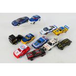 Scalextric - An unboxed group of 11 playworn Scalextric slot cars. Lot includes Ford Capri 3.