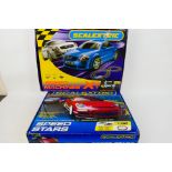 Scalextric - Two boxed Scalextric sets.