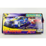 Scalextric - A boxed Scalextric 'Le Mans X4' set.