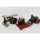 Mamod - Two unboxed Mamod steam vehicles with an unboxed Mamod stationary steam engine.