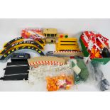 Scalextric - A collection of unboxed vintage accessories which include Dunlop Bridges; Autostart;