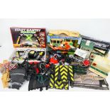 Scalextric - A mixed collection of boxed and largely unboxed Scalextric slot car, buildings,