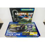 Scalextric - Two boxed Scalextric sets.