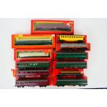 Triang - Hornby - A boxed rake of OO gauge freight and passenger rolling stock.