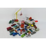 Corgi Toys - Dinky Toys - Others - An unboxed playworn collection of diecast vehicles in various