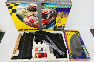 Scalextric - A boxed Scalextric 'John Cooper Challenge' set and a Scalextric C8307 Race + Lap