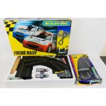 Scalextric - A boxed Scalextric 'Focus Rally' set and a Scalextric C8307 Race + Lap Counter Pack.