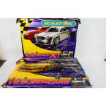 Scalextric - Two boxed Scalextric sets.