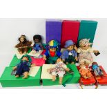D'Anton - A collection of 9 x boxed D'Anton dolls, Winston, Cheyanne, Jordan, Charlotte, Alexander,