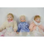 Porcelain dolls. A set of Three small dolls, porcelain hears and hands.