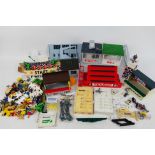 Scalextric - A boxed and unboxed collection of vintage Scalextric accessories and parts.